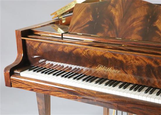 A Bluthner Model 6 flame mahogany cased grand piano, W.4ft 10in. L.6ft 3in. H.3ft 3in.